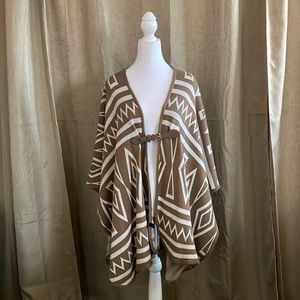 Beautiful tan poncho - one size fits most due to loose fitting.